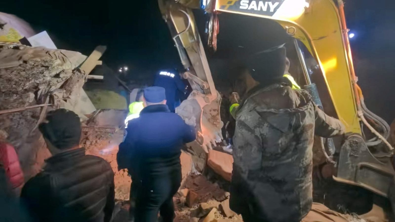 Emergency services personnel coordinate rescue efforts following an earthquake, at a location given as Nagqu, Tibet Autonomous Region, China in this still image from video released October 23, 2026. Nagqu Police Department/Handout via REUTERS REUTERS