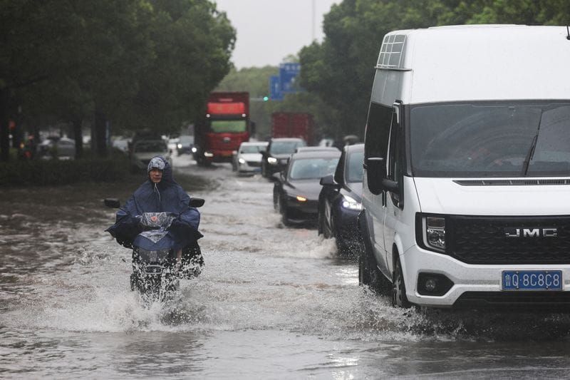 Typhoon Dolphin Floods Central China as Beijing Braces for a Year's Rain in a Day post image