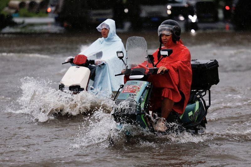 Typhoon Dolphin Floods Beijing Roads and Breaks Rainfall Records Across China post image