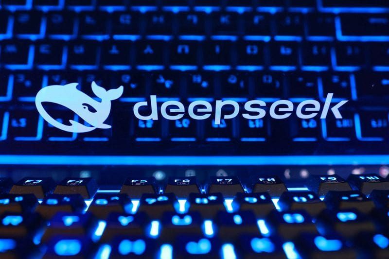 Illustration shows Deepseek logo and keyboard