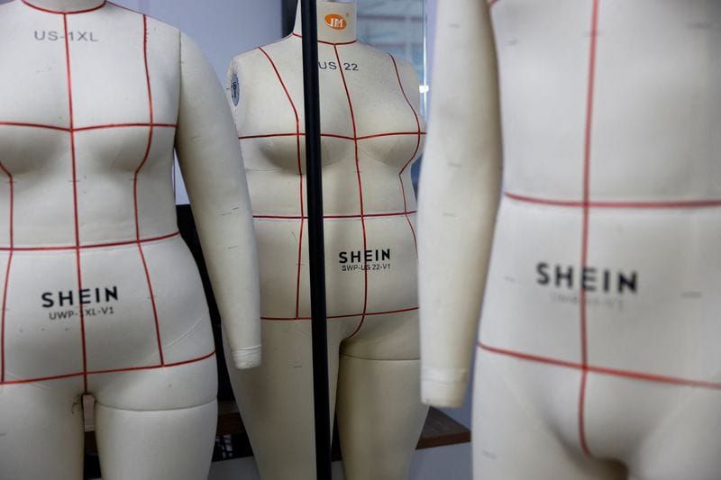 Dress form Mannequins with SHEIN logos are seen in Guangzhou