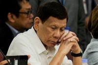 FILE PHOTO: Former Philippine President Rodrigo Duterte attends the House Quad Committee hearing at the House of Representatives, in Quezon City