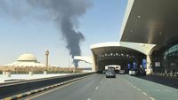 Large plume of black smoke rises from the fuel storage depot at King Khalid International Airport, in Riyadh