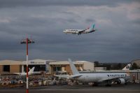Passengers from a FlyDubai flight to Israel from United Arab Emirates that was diverted to Saudi Arabia after an emergency signal arrive at Ben Gurion International Airport