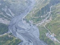 A drone view shows the areas affected by flooding of Budhi Gandaki River following a dry landslide in Chumnubri village, Gorkha district
