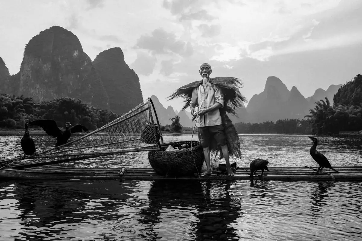 Chinese_cormorant_fisherman-1-1.webp