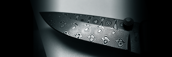 Veitsi, damaskiteräksinen.