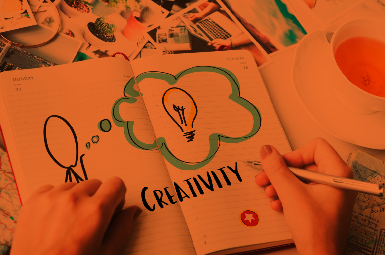 Woman drawing on a calendar "Creativity"