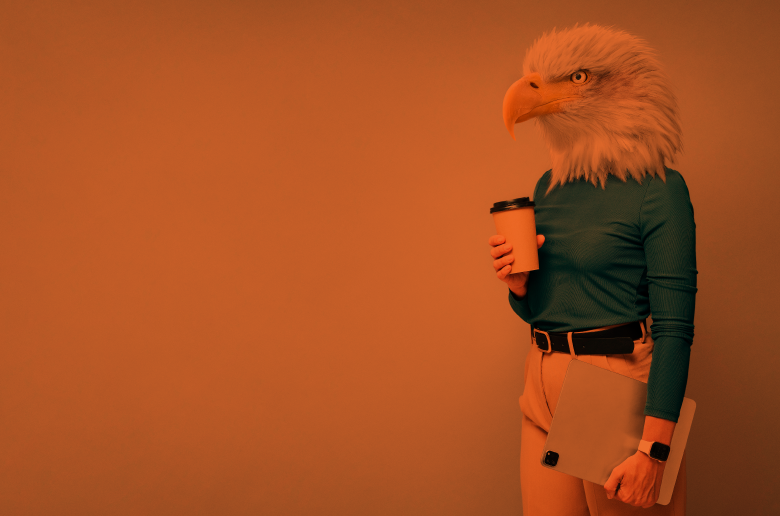 Person wearing an eagle mask on their head.