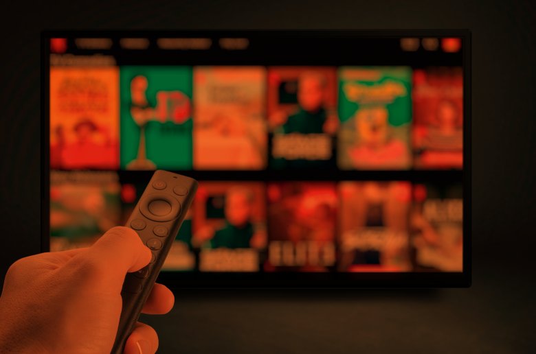 Guy holding a remote.