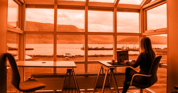 Professional working flexibly from home representing remote and hybrid jobs in Cyprus.