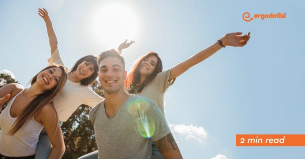 Professionals collaborating in a modern office workplace discussing flexible work