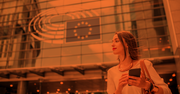 Woman walking over the EU parliament in Brussels.