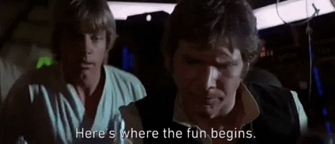 A Star Wars GIF with Han Solo saying "Here's where the fun begins" in a cockpit