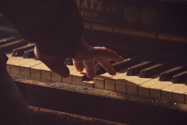 Person composing on piano