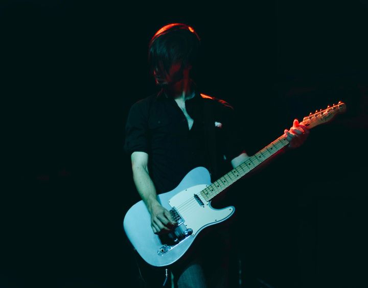 Guitarist playing a guitar solo using a Fender Telecaster