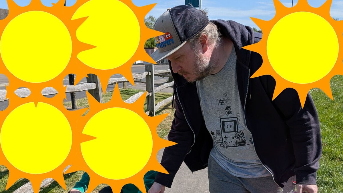 Me in the sun, worrying about the sun on my daughter, who is on a bike.