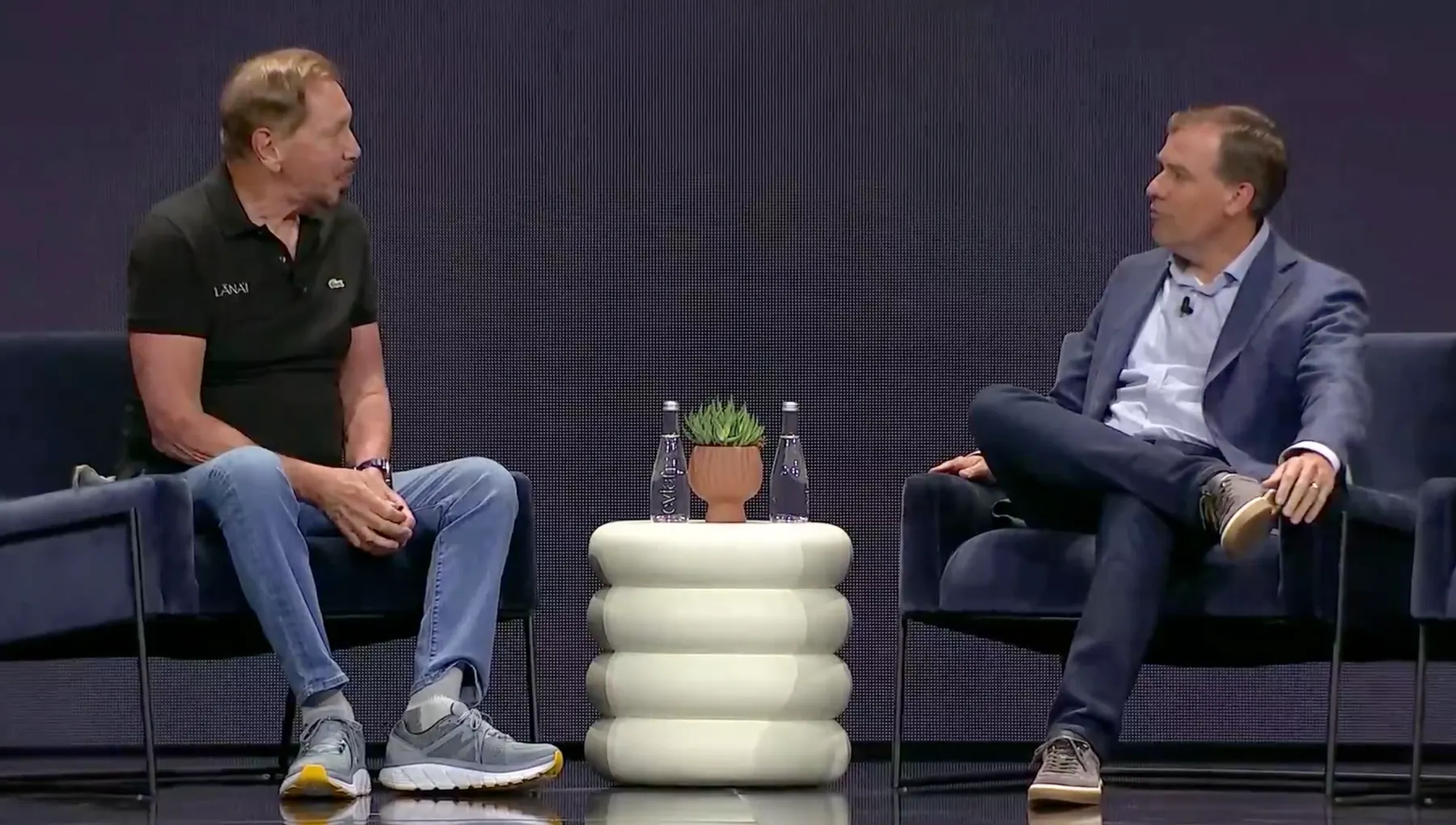 Oracle co-founder and CTO Larry Ellison (left) with AWS CEO Matt Garman on stage at Oracle CloudWorld 2024