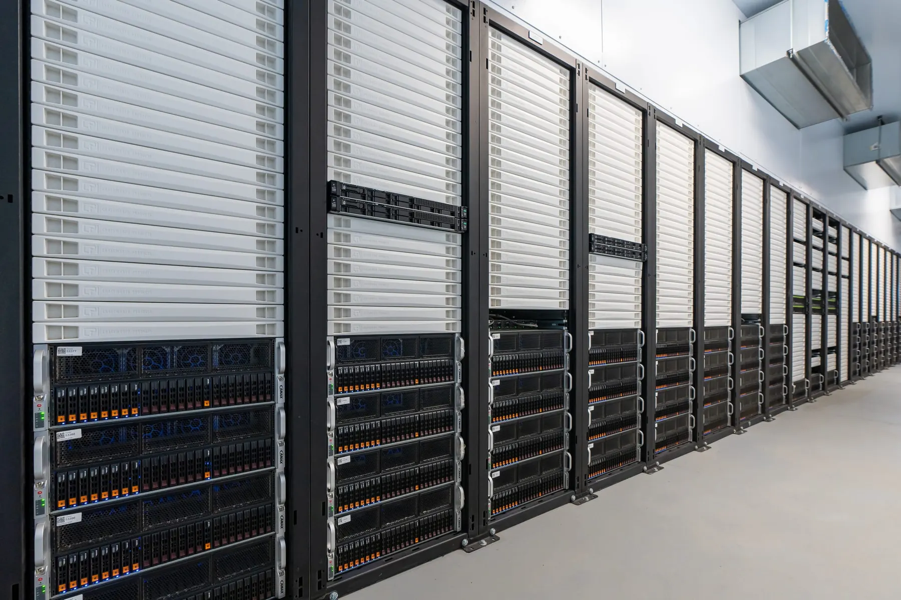 Several racks of servers in a Crusoe data center.