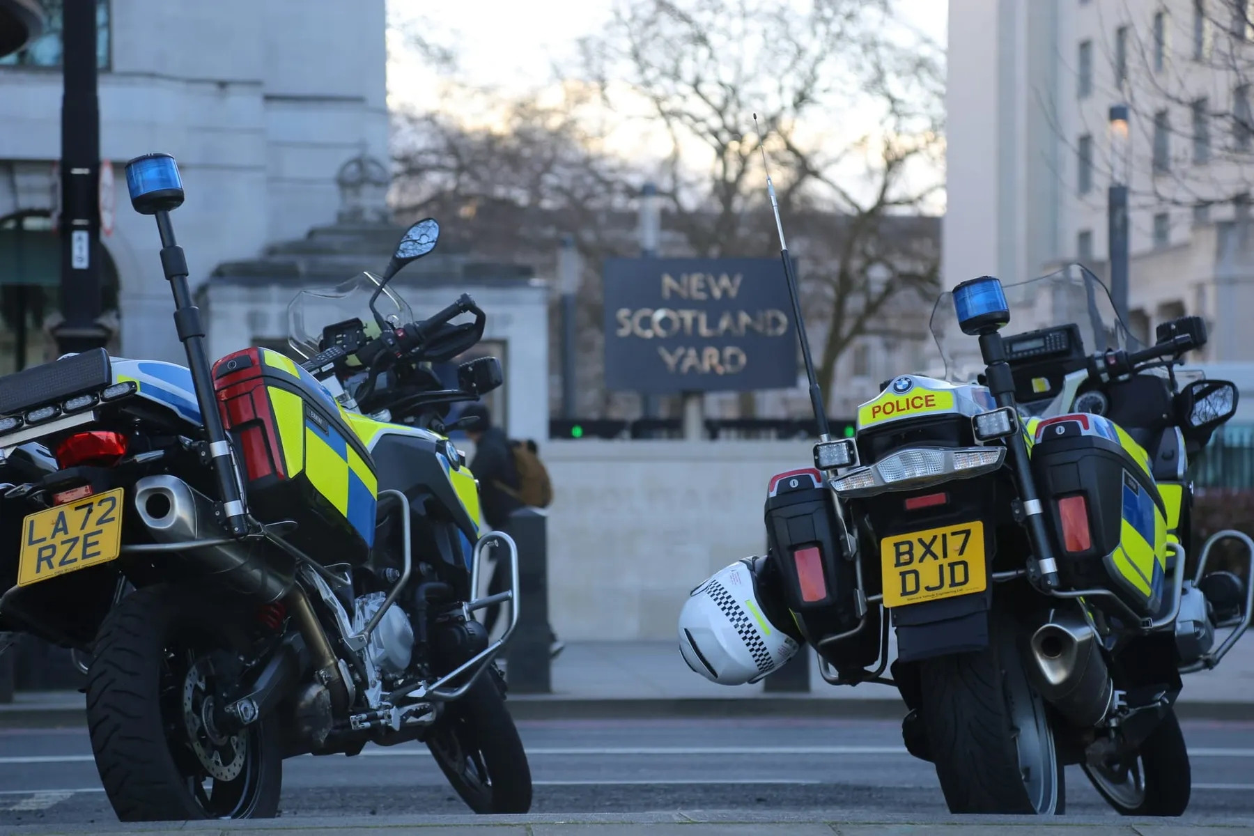 Two Metropolitan police bikes parked in front of the New Scotland Yard building. The Met police force is looking for a new IT Application Management Services supplier