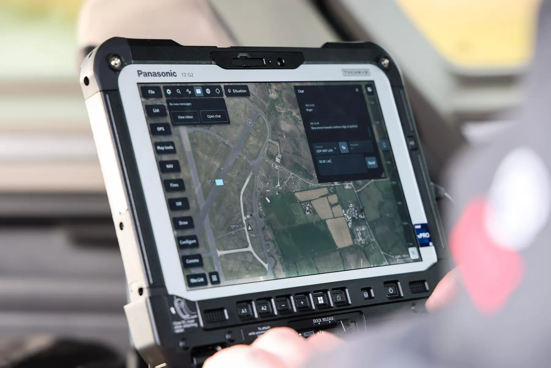A military computer showing footage of a landscape from a drone