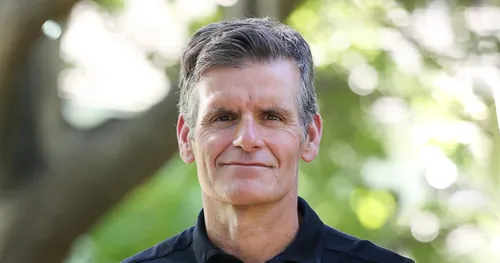A headshot of Freshworks CEO Dennis Woodside