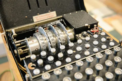 A close up of an enigma encryption machine. Post-quantum cryptography implementation is necessary for the next generation of encryption