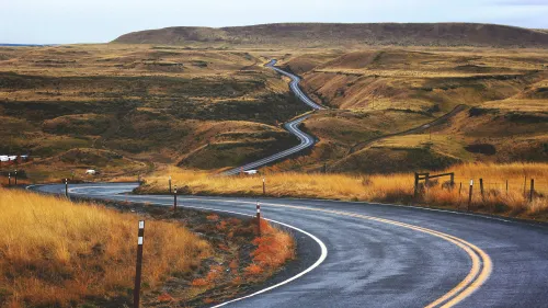 A long road leading up over a hill. Direct Line's cyber operations team took over implementation of a cloud security platform 