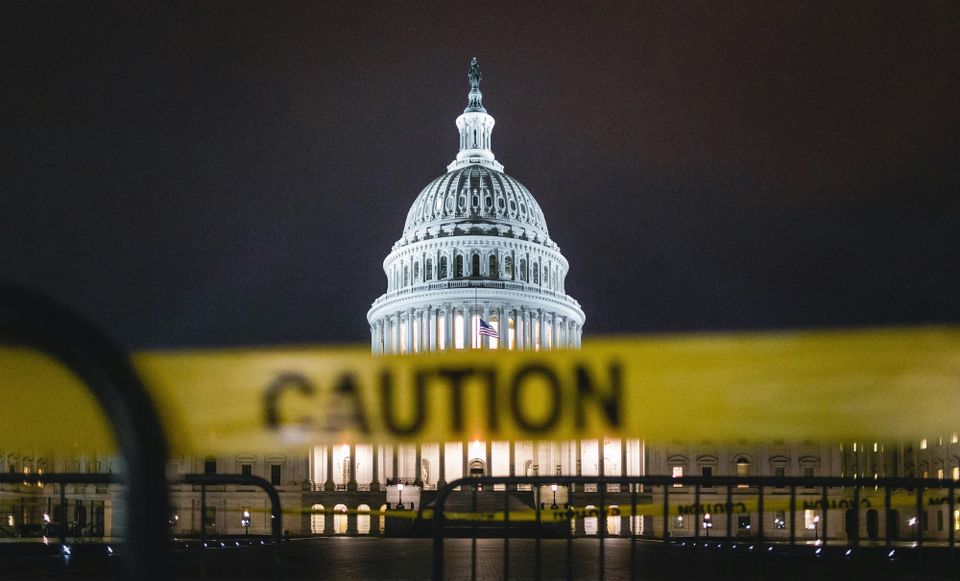 The US capitol building with caution tape in front of it, the government has been warned of the "catastrophic impact" related to aging IT system
