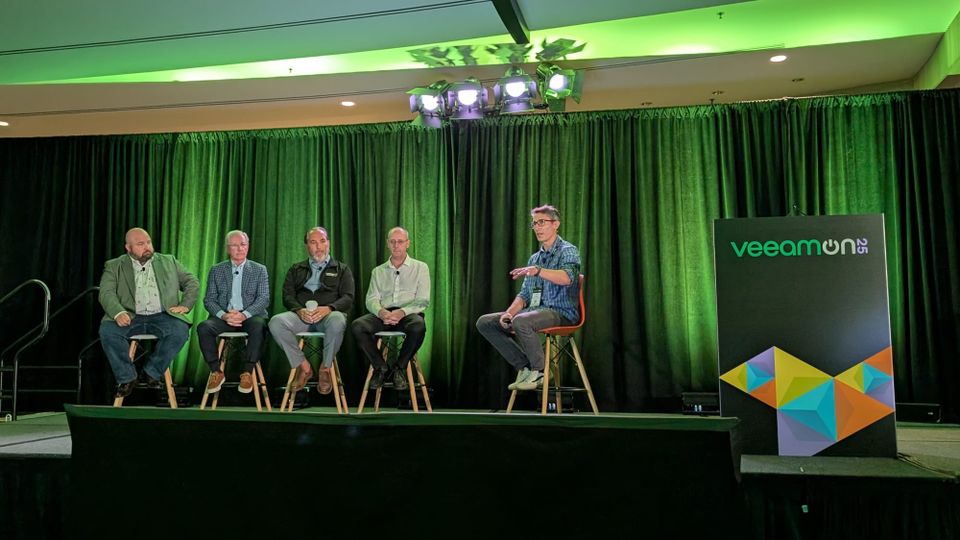 A panel of CISOs discussing cyber resilience at VeeamON
