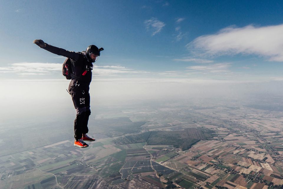 A man skydiving. AWS said its cloud services market share had significantly fallen in the UK