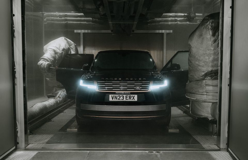 A JLR Range Rover undergoing final checks at a factory.