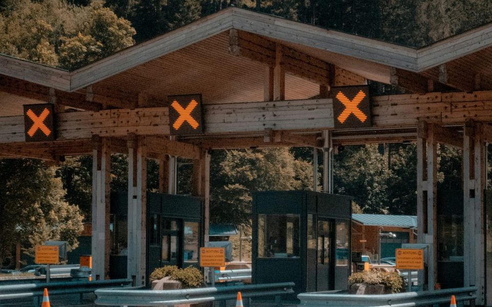 Motorway toll booths with large Xs above them. AI pay-to-crawl systems 