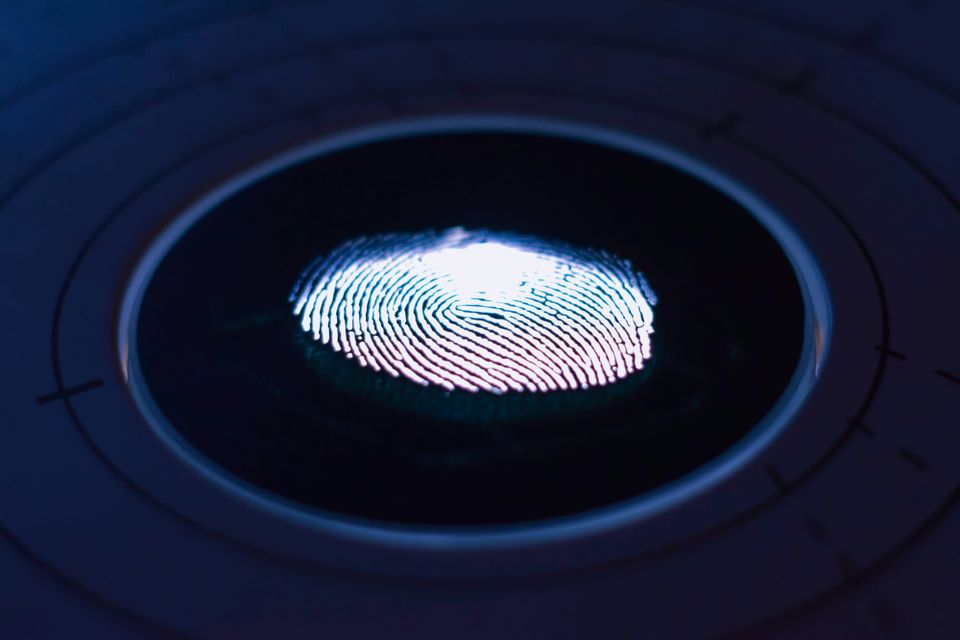 A thumbprint on a digital sensor. UK police have struggled with digital forensics.