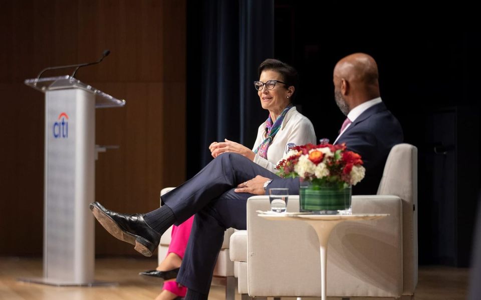 Citigroup CEO Jane Fraser sits on stage with a Citi branded podium in the background