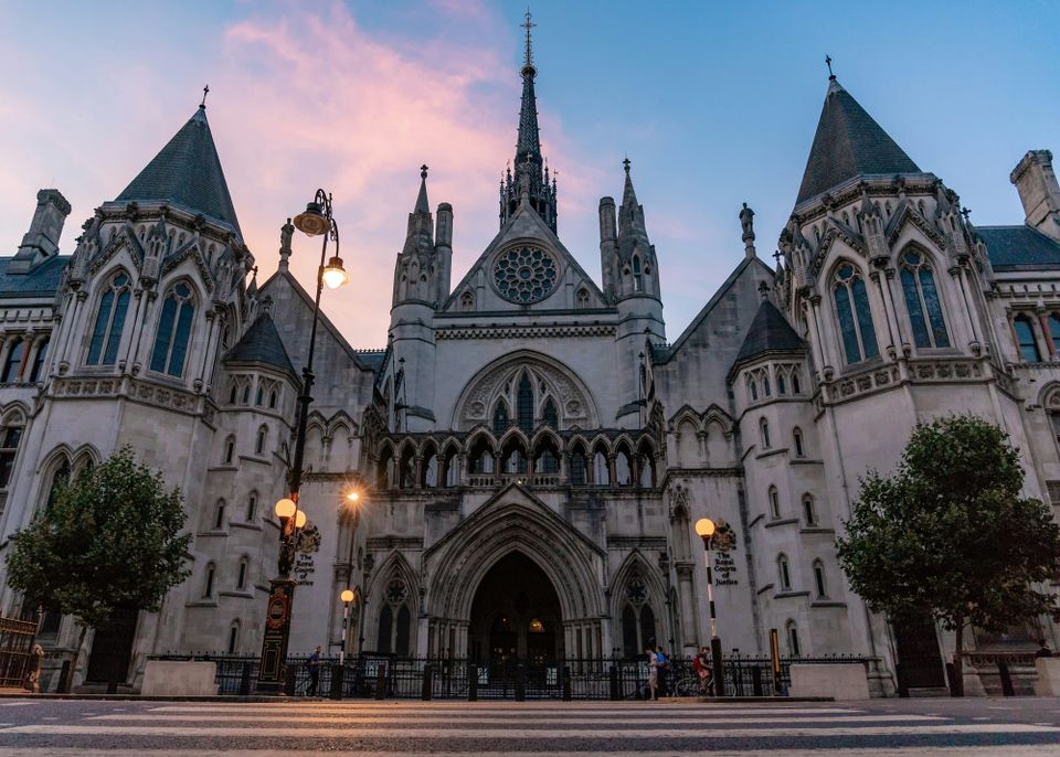 The UK's Royal Courts of Justice. The Ministry of Justice is trialling AI tools for court transcriptions.