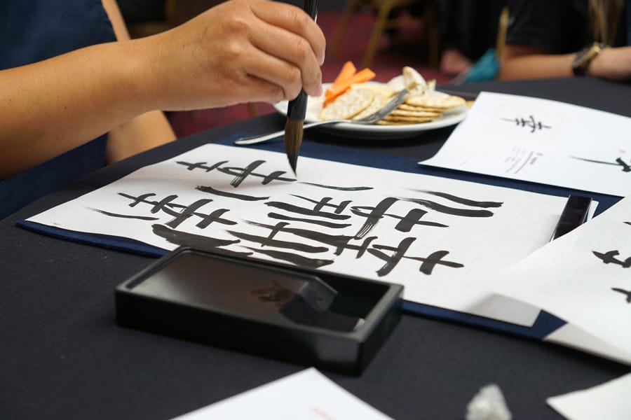 Cookies & Clogs | Travel | Hotels | During the J-POP Summit 2016 event with Mazda, my family and I were able to explore Japantown in San Francisco, CA and some of the Japanese culture. Traditional Japanese calligraphy is truly an art - see how our lesson with a calligraphy master went.