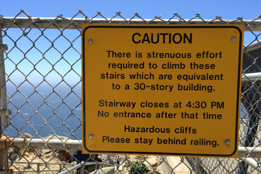 point-reyes-lighthouse-05 Cookies & Clogs | Want to take a family road trip to Point Reyes National Seashore in Point Reyes, CA? Here are several things to do with the kids including the Point Reyes Lighthouse. See what the climb down is like and if it's worth the trek. Warning sign
