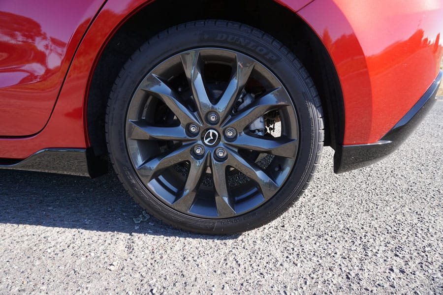 Cookies & Clogs | Cars | The 2016 Mazda3 is a great compact hatchback that's perfect for small families, singles, or commuters. See the pros and cons of this stylish addition to the Mazda line-up. Black / graphite rims