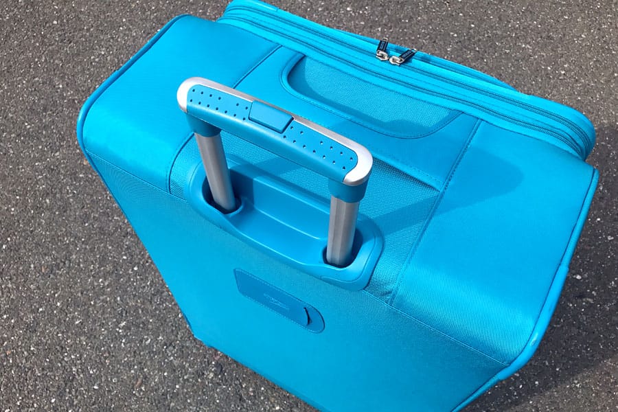 Cookies & Clogs | Travel | When flying, especially if you're doing international travel, it can be frustrating to meet baggage allowance limits and stay under a specific luggage weight. Using lightweight suitcases like the American Tourister iLite Max collection.