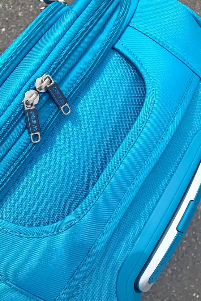 Cookies & Clogs | Travel | When flying, especially if you're doing international travel, it can be frustrating to meet baggage allowance limits and stay under a specific luggage weight. Using lightweight suitcases like the American Tourister iLite Max collection.
