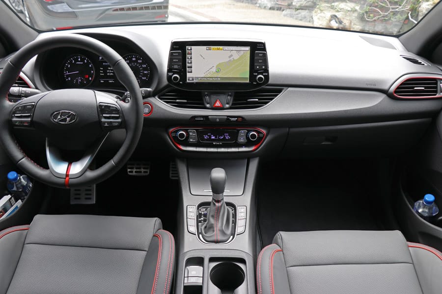 2018 Hyundai Elantra GT review. Interior dash with red accents.