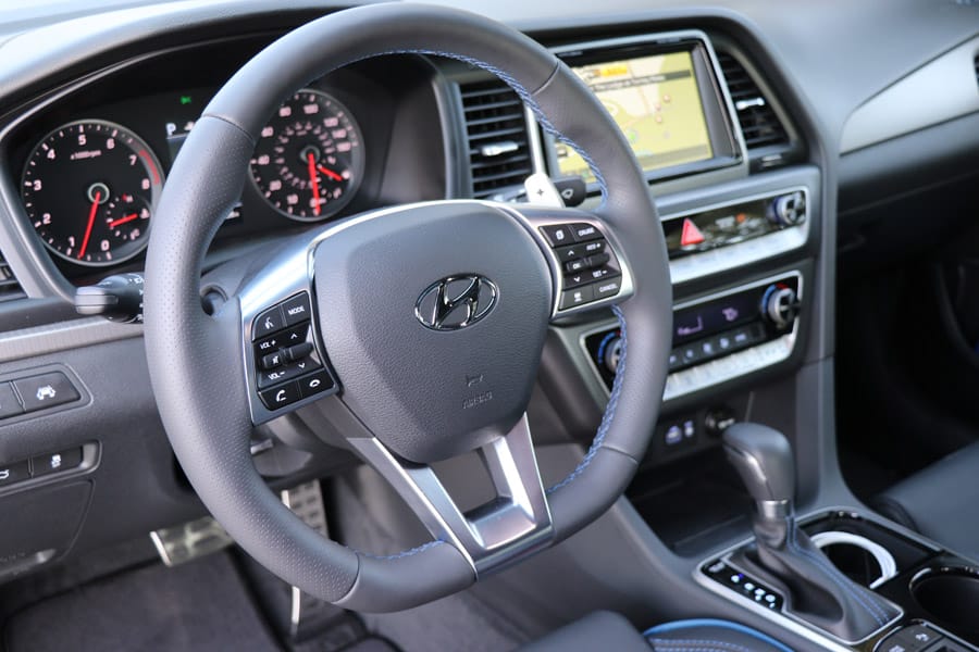 2018&nbsp;Hyundai Sonata Sport gray interior with D shape steering wheel and blue accents