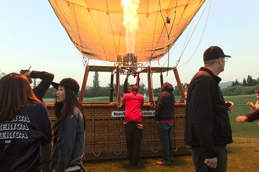 Hot air balloon ride over Napa Valley California inflating balloon