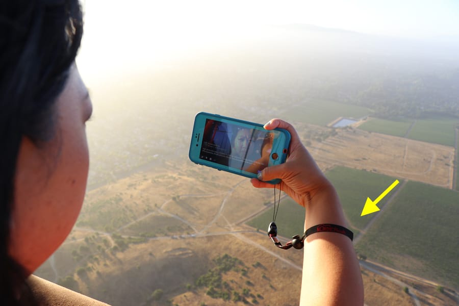 Hot air balloon ride over Napa Valley California Facebook Live with cell phone wrist strap