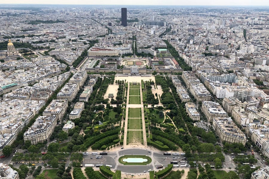 Paris Travel Guide: Top tips for how to visit the top of the Eiffel Tower in Paris France Paris overview of Champ de Mars and Montparnasse Tower