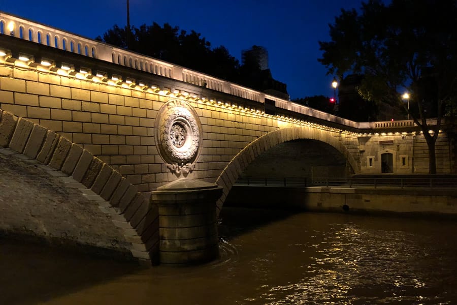 Best Paris boat tour tips for sightseeing cruise on the seine in Paris, France. Bridge