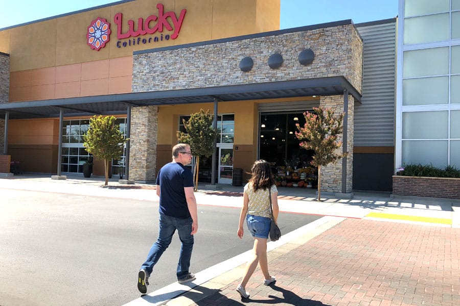 Back to School Grocery List and School Lunch Ideas. Teen shopping at Lucky Supermarket with optional ClickClick online grocery shopping and curbside delivery.