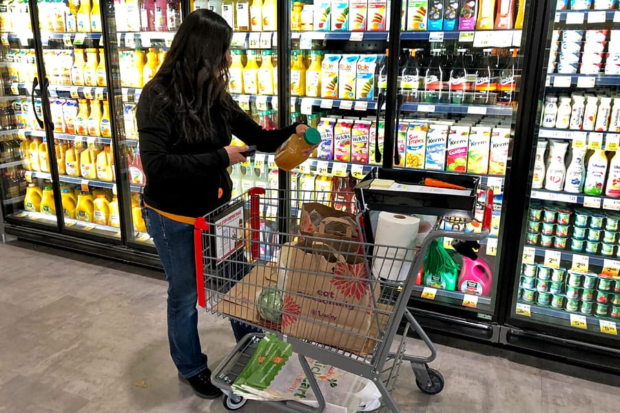 Back to School Grocery List and School Lunch Ideas. Teen shopping at Lucky Supermarket with optional ClickClick online grocery shopping and curbside delivery.