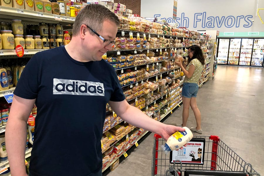 Back to School Grocery List and School Lunch Ideas. Teen shopping at Lucky Supermarket with optional ClickClick online grocery shopping and curbside delivery.